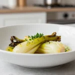 Heerlijk gestoofd witloof bereid in de Heteluchtfriteuse, perfect voor een smaakvolle maaltijd.