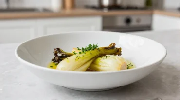 Heerlijk gestoofd witloof bereid in de Heteluchtfriteuse, perfect voor een smaakvolle maaltijd.