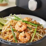 Heerlijke Pad Thai bereid in de Airfryer met verse ingrediënten en een unieke smaak.